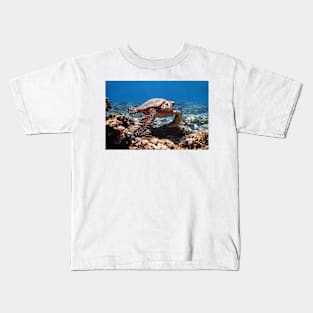 a turtle swimming under water on gili meno island in indonesia Kids T-Shirt